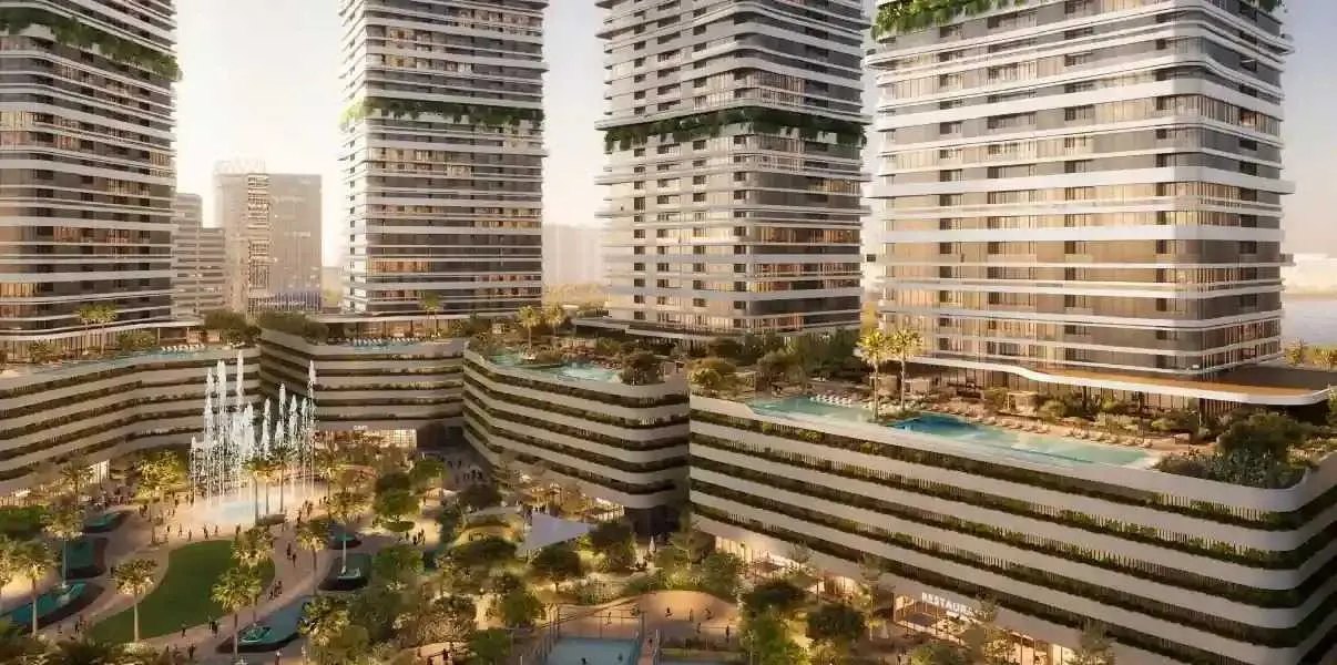 Podium level pools and landscaped terraces at LINAR by Alef